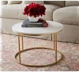 A round white and gold coffee table